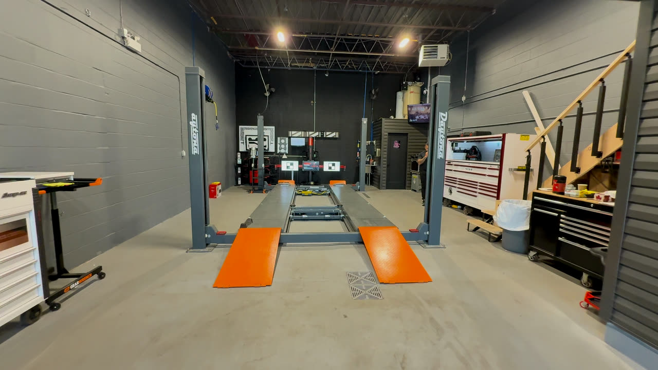 The alignment bay seen straight on, lift lowered and ramps out