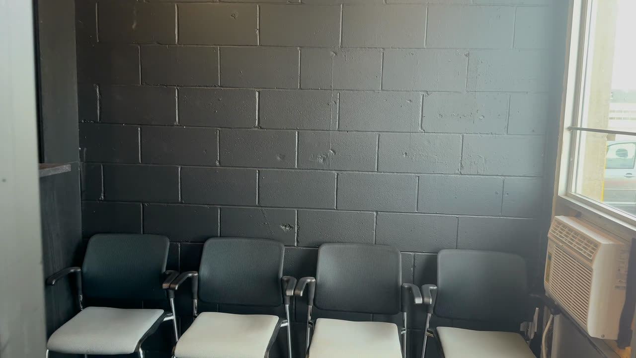 The waiting room chairs under the window