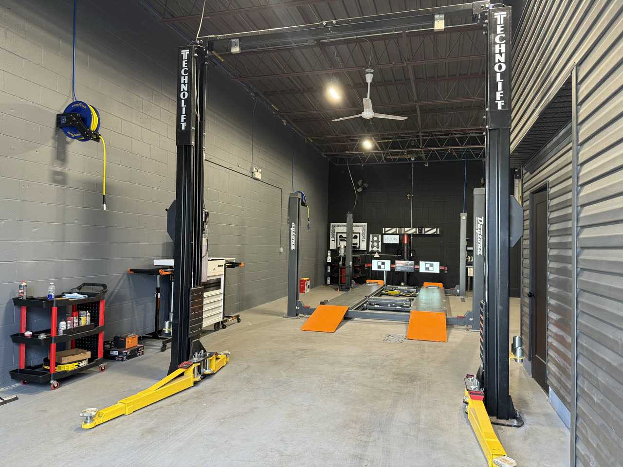 Two Technolift two post lifts in the drive through bay
