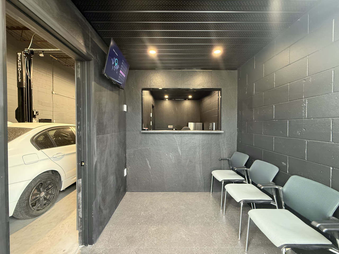 The waiting room door opens onto the bay